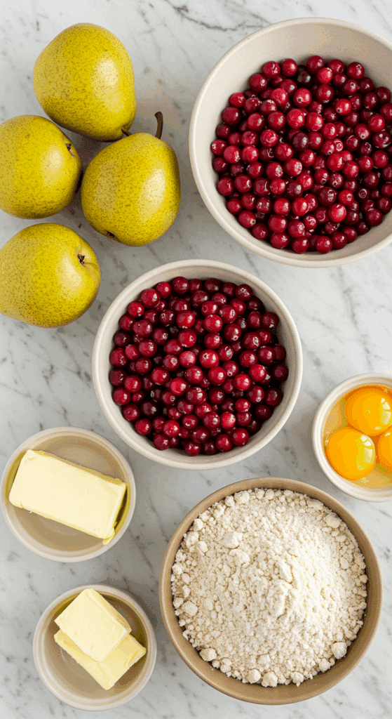 The fresh, from-scratch ingredients for the elegant Pear and Cranberry Crostata with almond cream.