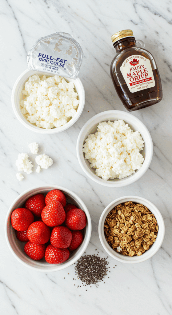 The simple, healthy ingredients for the Strawberry Cheesecake Breakfast Parfait.