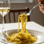 An elegant plate of homemade, silky Spaghetti Aglio e Olio being enjoyed for a healthy and sophisticated dinner.
