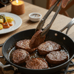 The finished skillet of homemade Pan-Seared Steaks being served at a cozy family dinner.