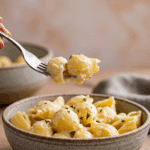 A cozy bowl of homemade, creamy Vegan Pasta being served for a healthy and satisfying dinner.