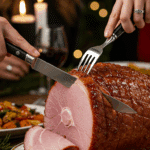 The whole, homemade, impressive, and glazed Holiday Ham being carved as the centerpiece at a fun and sophisticated Christmas party.