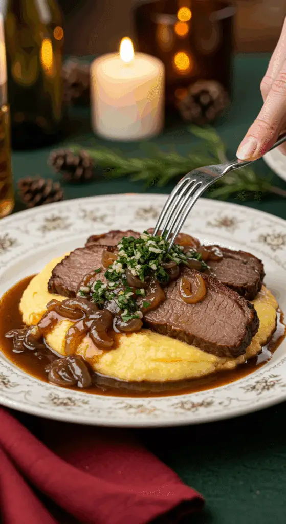 A beautiful plate of a homemade, elegant, and sliced Braised Brisket, being served over creamy polenta with a green gremolata at a holiday dinner.